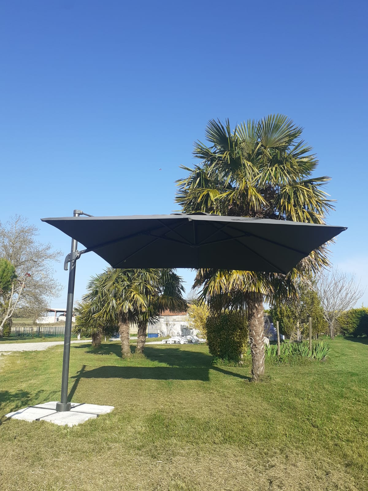 Parasol déporté 3x3 inclinable